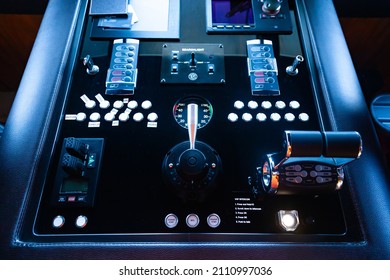 Black luxury yacht control panel with buttons and control levers and on-board computer. - Shutterstock ID 2110997036