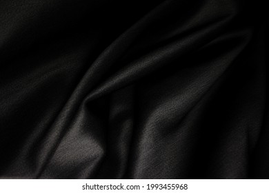 Black lycra fabric in soft fold.