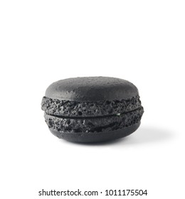 Black Macaron Isolated On White Background With Shadows