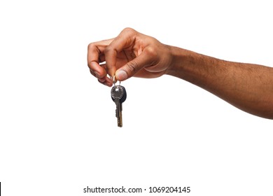 Black Male Hand Holding Key To House, Car Or Business, Motivation Poster Isolated On White Background, Copy Space