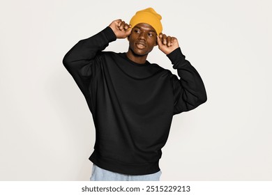 Black male model wearing yellow beanie  - Powered by Shutterstock