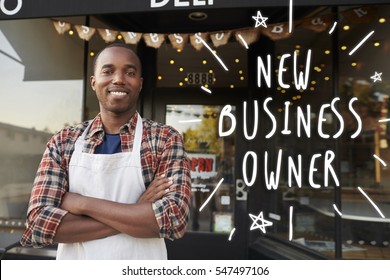 Black male new business owner standing outside coffee shop