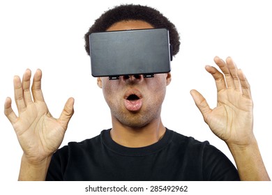 Black male wearing a virtual reality headset on a white background