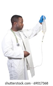 A Black Man African American Doctor Holding An IV Bag