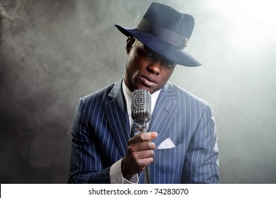 black singer with hat