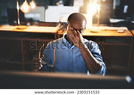 Black man in business, night and headache with stress and vision problem, crisis and burnout from overtime. Professional male with migraine, brain fog and work late with loss of focus and overworked