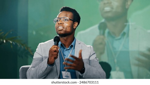 Black man, business seminar and speaking for presentation, teaching and discussion at work conference. African presenter, microphone and speech for networking workshop, idea pitch and education forum - Powered by Shutterstock