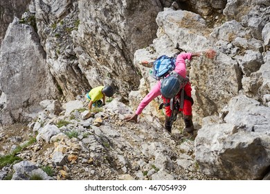 Black Man Climbing In The Alps / African Climber In Austria / Extreme Sport Mountaineer