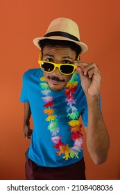 Black man in costume for brazil carnival isolated on orange background.  - Shutterstock ID 2108408036