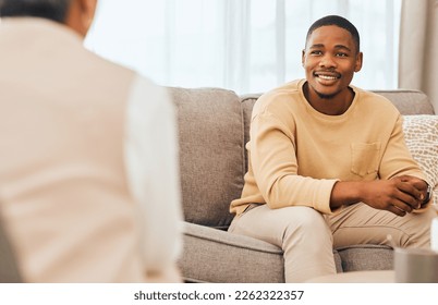 Black man, counseling and psychology consulting for therapy, mental healthcare or support. Happy patient talking to psychologist, therapist and medical help in consultation, advice and wellness check - Shutterstock ID 2262322357