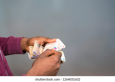 Black Man Counting Money 