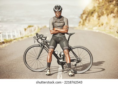 Black Man, Cycling And Mountain Bike With Arms Crossed For Sports Exercise, Training And Fitness In Nature. Portrait Of A Confident African American Male Professional On A Bike Cycle Tour Outdoors