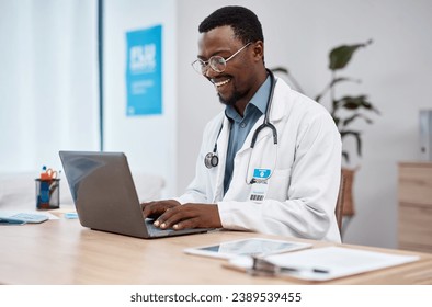 Black man, doctor and laptop with smile in healthcare for research, medicine or PHD at clinic desk. Happy African American male medical professional smiling, working or typing on computer at hospital - Powered by Shutterstock