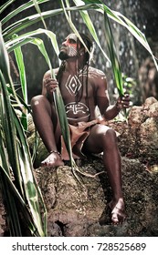 Black Man With Dreadlocks In The Image Of The Taino Indian In Habitat, Body Painting Taino Symbols