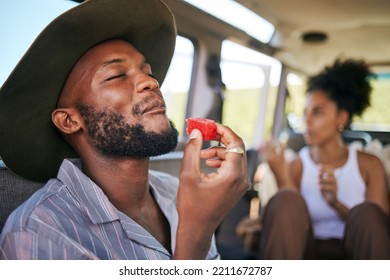 Black Man, Eating Watermelon And Summer Fruit On Safari Game Drive In Sustainability Nature Or Environment Landscape Travel. Smile, Happy Tourist Or Couple And Diet Health Food In Kenya National Park