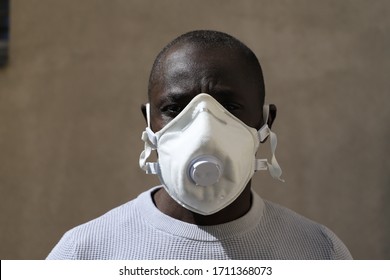 Black Man With Face Mask In Portrait 