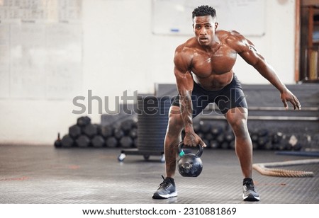 Black man, fitness and weightlifting with kettlebell for workout, exercise or training at the gym. African male person or muscular bodybuilder lifting weight for strength sports or intense exercising