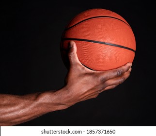 Black Man Hand Holds Basketball Ball