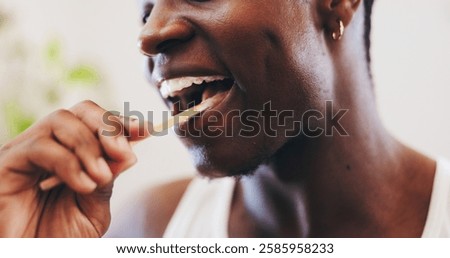 Black man, hands or brushing teeth with toothbrush for dental hygiene, morning routine or fresh breath at home. Closeup, male person or smile with bamboo stick for oral, mouth or gum care in bathroom