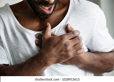 Black man having a heart attack