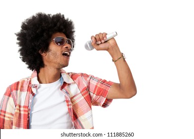 Black Man Holding A Microphone And Singing - Isolated Over A White Background