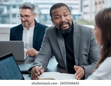 Black man, manager and mentor with laptop for instruction in office for meeting, strategy and discussion in workplace. Businessman, coaching and computer on desk for planning, support and guiding - Powered by Shutterstock