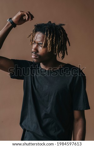 Black man modeling in a studio