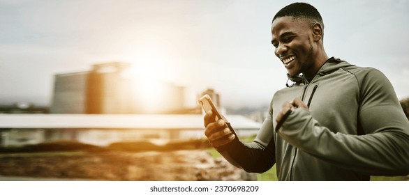 Black man, phone and technology with happy fist for notification, workout break or winner outdoor in the morning. Smartphone, person and happiness for good news, fitness deal or challenge in the city - Powered by Shutterstock