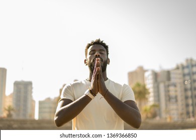 black man praying 