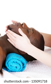 Black Man Recaiving Head Massage At Spa, Isolated On White