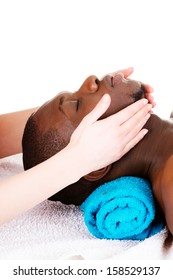 Black Man Recaiving Head Massage At Spa, Isolated On White