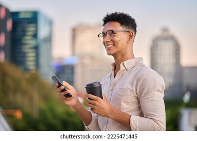 Black man, smartphone and coffee outdoor, in city and smile being trendy, casual and sunset. Gen z, travel and cellphone to connect, happy and online browse for social media, chatting and happiness
