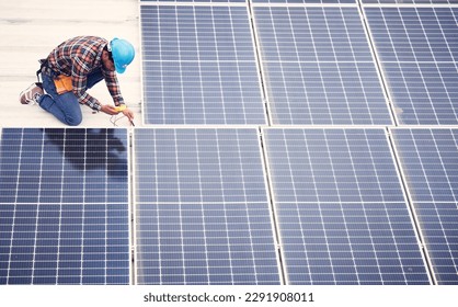 Black man, solar panel installation and renewable energy, sustainability and eco friendly technology. Maintenance, male engineer and infrastructure, electricity and top view with energy saving - Shutterstock ID 2291908011