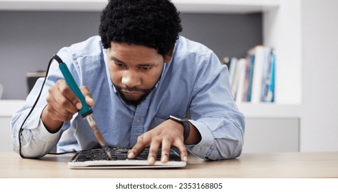 Black man, soldering iron and fixing circuit board, computer hardware and maintenance with electronics upgrade. Tools, motherboard and CPU, engineering and electric repair with technology in office - Powered by Shutterstock