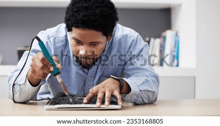 Black man, soldering iron and fixing circuit board, computer hardware and maintenance with electronics upgrade. Tools, motherboard and CPU, engineering and electric repair with technology in office
