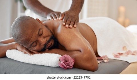 Black Man, Spa And Luxury Back Massage At A Physical Therapy Session Or Beauty Salon. Wellness, Relax And Peace Feeling Of A Person Calm, Relaxing, Resting At Massage Therapist With Hospitality Care