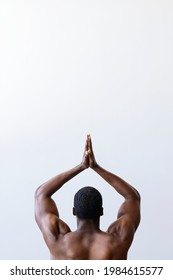 Black Man Stretching His Back Muscles