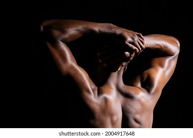 Black Man Stretching His Back Muscles