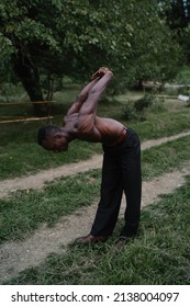 Black Man Stretching His Back Muscles