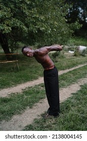 Black Man Stretching His Back Muscles