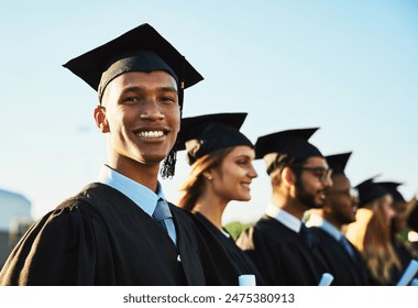 Black man, student smile and graduation ceremony with class group for education, qualification or future. Portrait of happy person and scholar with goals for diploma, certificate or degree on campus