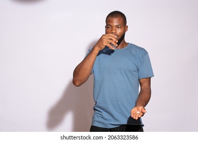 Black Man Taking His Medication