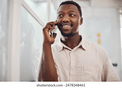 Black man, talking and phone call in office for conversation, listening or contact with client. Business person, thinking and creative consultant for negotiation, advice or explain project details - Powered by Shutterstock