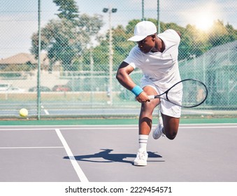 Black man, tennis and ball, fitness sport and racket with exercise, workout and training outdoor in summer. Athlete, sports and competition on tennis court , summer and game with action and match - Powered by Shutterstock