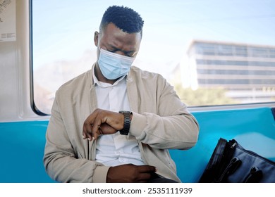 Black man, train and check watch on travel, journey and face mask for safety, virus or pollution. Person, clock and time on business trip with ppe, reminder and public transport with thinking on ride - Powered by Shutterstock