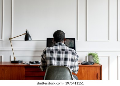 Black man using a computer