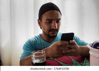 black man using a smartphone