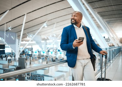 Black man waiting in airport with phone, smile and luggage in terminal for business trip. Technology, travel and happy businessman with international destination checking flight schedule app online. - Powered by Shutterstock