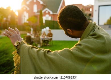 Black Man Waving Hand During Lunch With His Friends On Backyard Outdoors