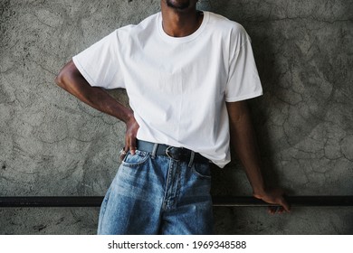 Black Man Wearing A Silk Screen White T-shirt Mockup